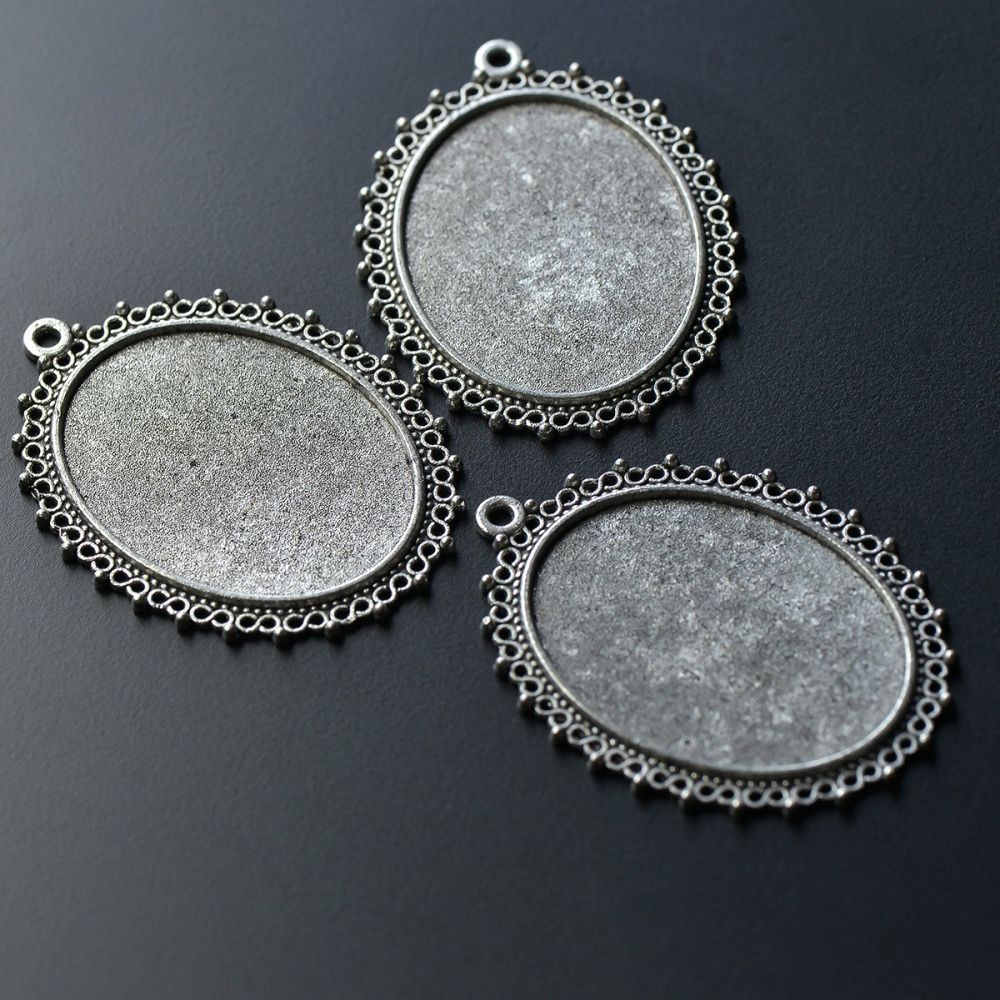 для кабошона размером 40х30 мм.