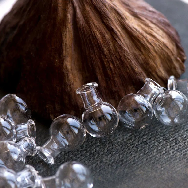 бутылочка круглая, прозрачная, 26x18 мм