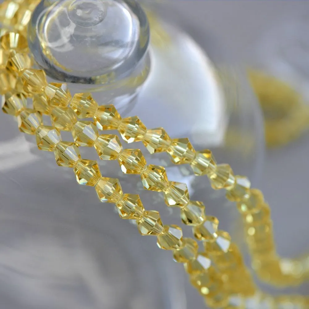 бусина, стекло биконус 6, цвет бледно-желтый, 6 мм