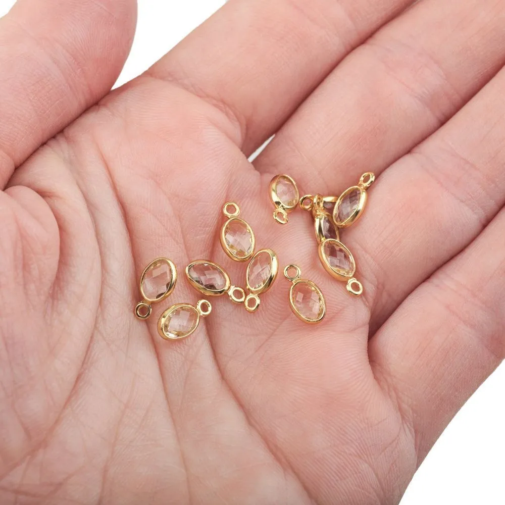 подвеска металл "эллипс", позолота/прозрачный, 9x4.5x2 мм