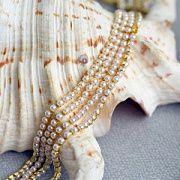 Цепочка "Перл", исск. жемчуг кремовый, цвет золото, 2.5 мм, стразовая лента